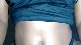 Beautiful black lady massages her huge tits so erotically!