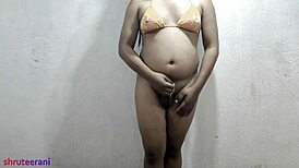 Homemade Indian shemale crossdresses micro bikini shakes big tits ass