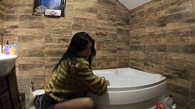 Milfycalla Pees in Bathtub Wearing Fur Coat and Pantyhose Tease