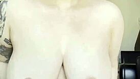 blonde babe flaunts massive natural big tits up close for your viewing thrill