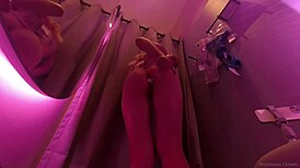 A juicy-assed girl slips on panties in the fitting room before getting busted touching herself publicly