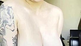 blonde babe flaunts massive natural big tits up close for your viewing thrill