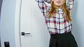 miniskirt babe strips dances gets slick with oil and fingers clit to squirting climax