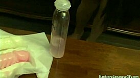 I'm the petite Asian babe toying my hairy pussy