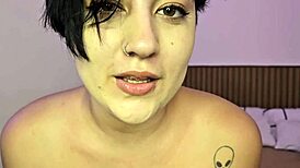 latina brunette strips lingerie on bed fingering her shaved pussy close-up