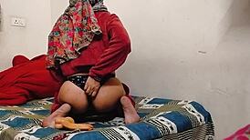 Housewife Teases with Dildo Play