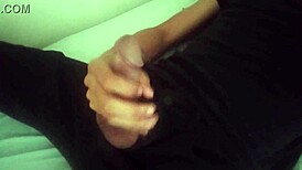 Horny guy jerks massive cock in black pants post-work