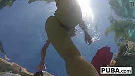 blonde milf olivia fingers her big tits and pussy poolside all nude