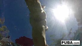 blonde milf olivia fingers her big tits and pussy poolside all nude