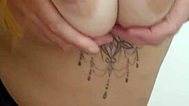 solo babe masturbates at table corner slapping her perky tits