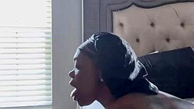 she slips off her ghetto bonnet and deepthroats that big black cock gagging and spitting till facial cumshot