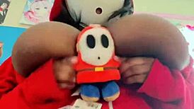 shyguy cosplay with massive oiled boobs and self sucking