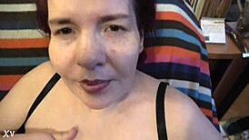 hey check this mature babe caressing her big tits