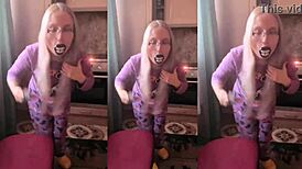 asmr blonde with glasses brushes long hair using lollipop, headphones on.