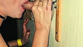 i sucked a huge endowed cock thru gloryhole at swing house an' he exploded cum in ma mouth