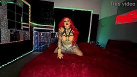 sexy redhead with huge fake tits big ass and pierced nipples teases stripping oiled curvy body