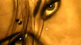 beautiful brunette teases with erotic undressing dance