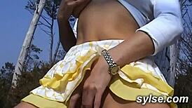 Horny milf flashes toys on beach drawing voyeurs then takes lesbian strapon pounding