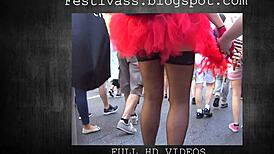 She struts in festivass microskirt with see-through thong and cheeky shorts peeking out