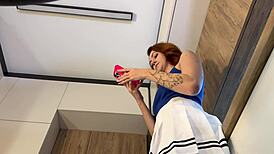 Hey check out this redhead hot wife modeling her new white miniskirt and pink panties before stripping