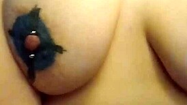 she caresses her huge natural tits before fingering smooth wet pink pussy