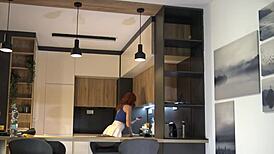 Hey check out this redhead hot wife modeling her new white miniskirt and pink panties before stripping