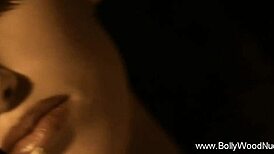 beautiful brunette teases with erotic undressing dance