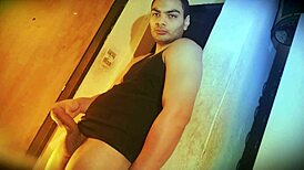 Why's this muscular bodybuilder's big cock so hard to lift against the wall?