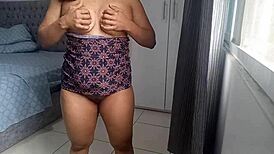 Neighbor spies housewife fingering her big tits and pussy nude