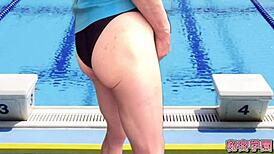 Cross-dressing slut rips swimsuit and masturbates in secret swim class