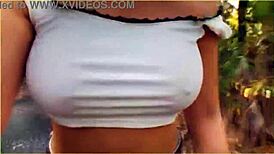 check out this daring milf flashing massive tits while riding public biker nude