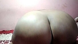 Indian wife plays with huge natural tits for friend