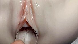 Pussy stuffed deep with thick realistic fake cock