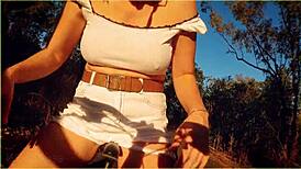 check out this daring milf flashing massive tits while riding public biker nude