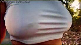 check out this daring milf flashing massive tits while riding public biker nude