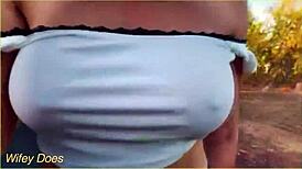 check out this daring milf flashing massive tits while riding public biker nude