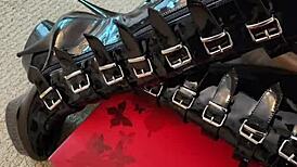 Kinky tattooed maid in lingerie flashes pierced nipples and buttplug in private california bath cage roleplay