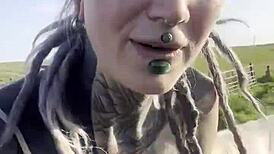 Tattooed Blackwork Hippie Girl Chats with Cows and Fans in Country Bodysuit