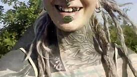 Tattooed Blackwork Hippie Girl Chats with Cows and Fans in Country Bodysuit