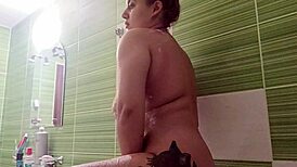 I masturbate my big titted tight pussy in shower