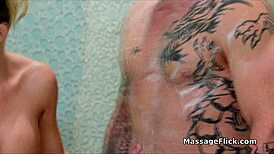 I test drive this big tit oiled masseuse sucking cock in the shower parlor