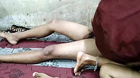 Desi girlfriend and own wife laid on bed for intense pounding in ranch country threesome