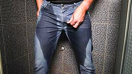 GUY SOAKS JEANS IN PEE THEN EXPLODES MASSIVE CUMSHOT OUTDOORS!