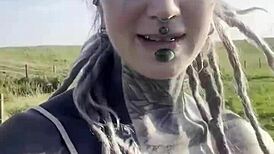 Tattooed Blackwork Hippie Girl Chats with Cows and Fans in Country Bodysuit