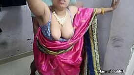 Desi Indian couple films homemade saree strip and passionate sex