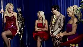 Blonde Milfs Rip Clothes and Use Big Tits to Start Wild Group Cock Sucking On Stage