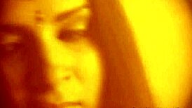 exotic dancer teases with ripped clothes revealing sensual curves