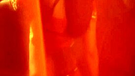 exotic dancer teases with ripped clothes revealing sensual curves