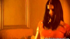 exotic dancer teases with ripped clothes revealing sensual curves