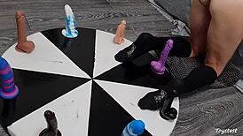 horny petite teen spins wheel of huge dildos anal toys for rough orgasm win